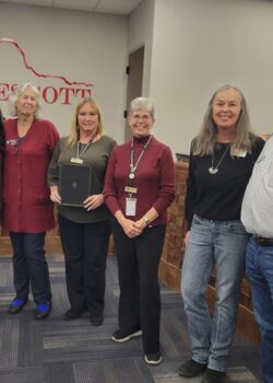 Image of Prescott Public Library Staff and Friends of Prescott Public Library board members accepting the Mayoral Proclamation for National Library Week.